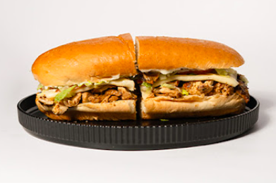 Q's Deli signature dishes Q's Best
The Q Stack
Chopped Cheese